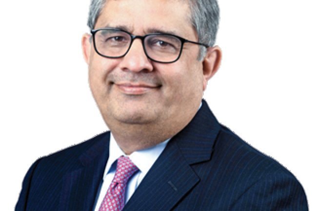 Axis Bank CEO Amitabh Chaudhry Highlights Challenges Amid Profit Growth